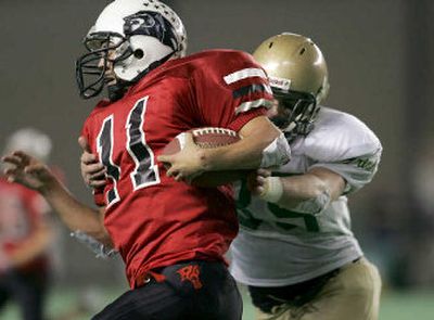 
Nick Ashley of Lind-Ritzville, left, was the 2004 AP player of the year. He'll be back to lead the Broncos again this season. 
 (File/Associated Press / The Spokesman-Review)