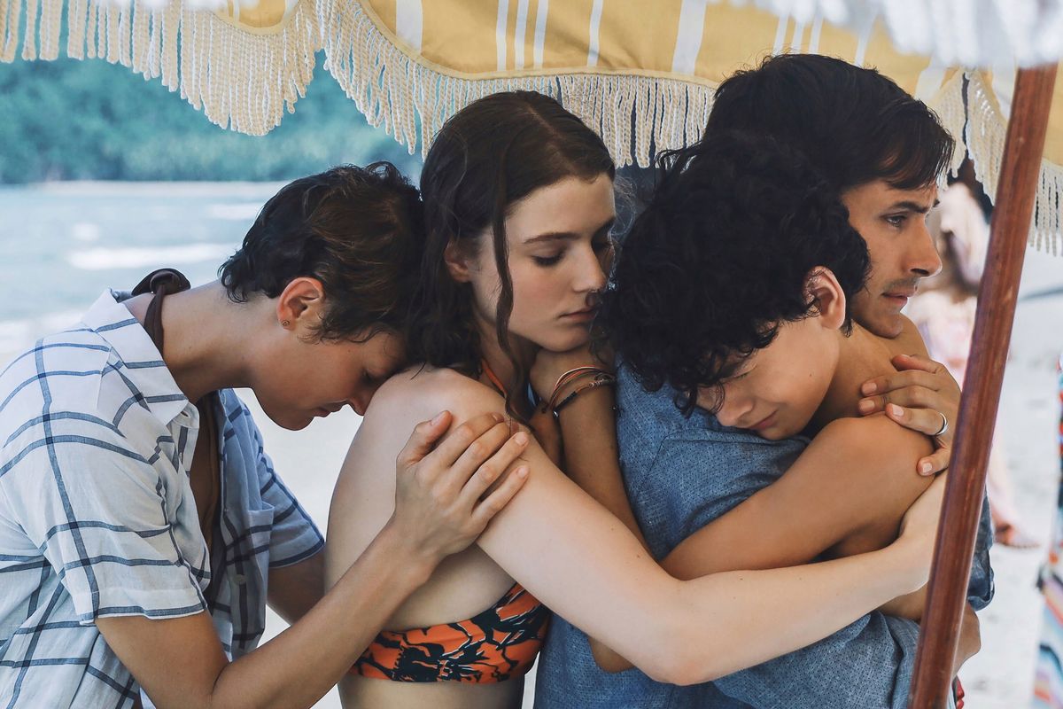 This image released by Universal Pictures shows Vicky Krieps, Thomasin McKenzie, Gael García Bernal and Luca Faustino Rodriguez in a scene from "Old."  (HONS)