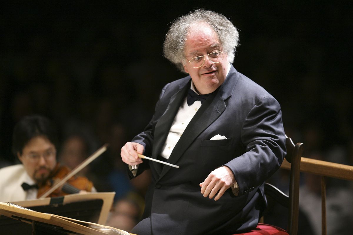 FILE – Boston Symphony Orchestra music director James Levine conducts the symphony on its opening night performance at Tanglewood in Lenox, Mass. on July 7, 2006. Levine, who ruled over the Metropolitan Opera for 4 1/2 decades before being eased out when his health declined and then fired for sexual improprieties, died March 9, 2021 in Palm Springs, Calif., of natural causes, his physician of 17 years, Dr. Len Horovitz, said Wednesday, March 17. He was 77.  (Michael Dwyer)