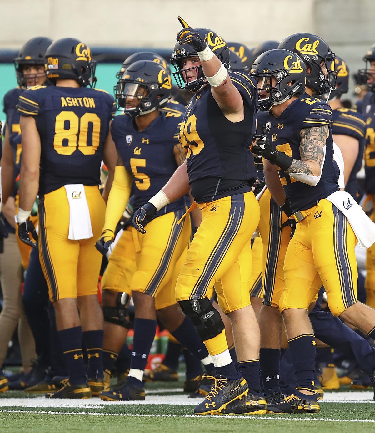 California’s Evan Weaver  celebrates after intercepting a pass against Washington for a touchdown during the second half last Saturday in Berkeley, Calif. (Ben Margot / AP)