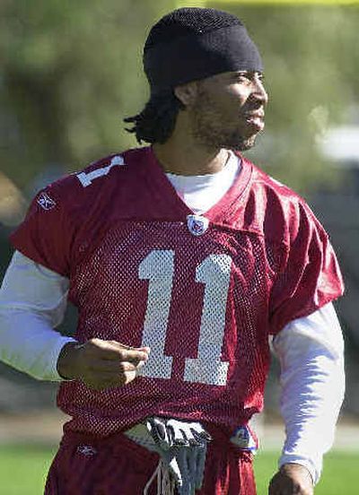 
Cardinals first-round draft pick Larry Fitzgerald has 14 catches but no touchdowns. He faces Saints today.
 (Associated Press / The Spokesman-Review)
