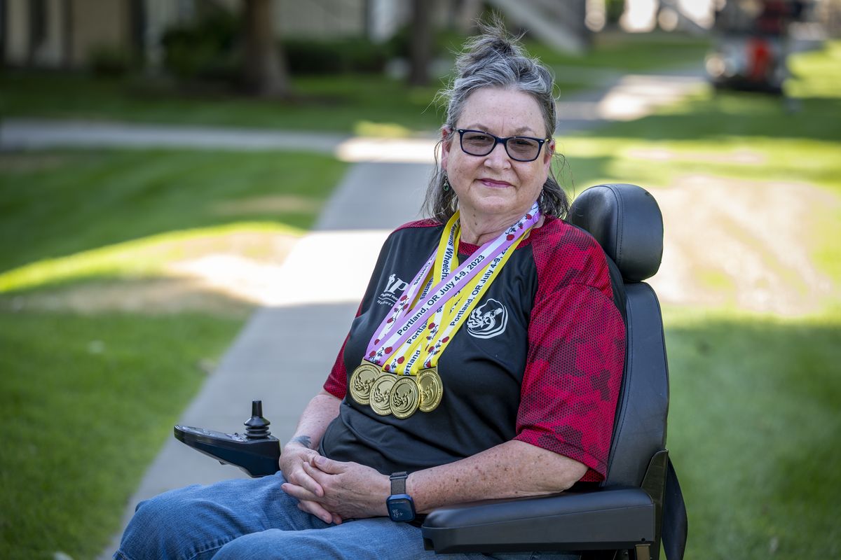 Tina Tuell, a veteran who served in the U.S. Navy, recently returned from the Paralyzed Veterans of America Wheelchair Games in Portland with four medals in various events.  (Jesse Tinsley/THE SPOKESMAN-REVI)