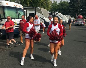 The Cougar cheer squad whips up the tailgating faithful outside Martin Stadium last year. (John Nelson)