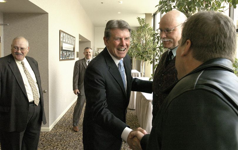ORG XMIT: IDLEW101 Idaho Gov. C.L. Butch Otter greets constituents outside a meeting room at the Red Lion Inn after speaking at the Rotary Luncheon Wednesday, April 29, 2009 in Lewiston, Idaho.(AP Photo/Lewiston Tribune, Kyle Mills) (Kyle Mills / The Spokesman-Review)