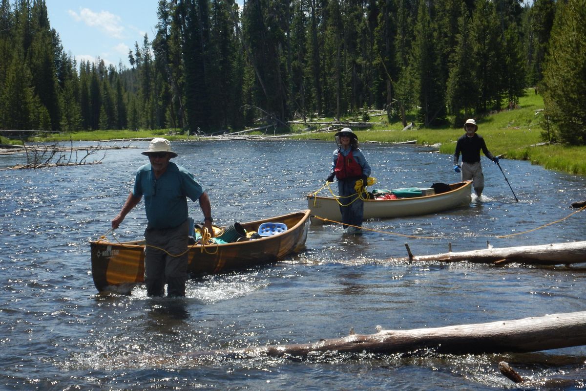 Misery loves company, so lining boats up the Lewis River to Shoshone Lake is a memorable part of the journey. (William Brock / COURTESY)