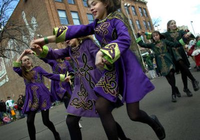 
Madi Leyva, 11, dances with Chloe Evans, 9, and the Kelly Irish Dancers of Chattaroy on Saturday. 
 (The Spokesman-Review)