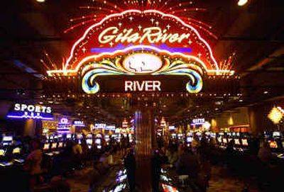 
Neon lights welcome visitors at the Gila River Casino in Casa Blanca, Ariz. Indian casinos continue to prosper nationwide.
 (Associated Press / The Spokesman-Review)