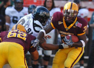 
ASU's Cole Ptacek battles for yards in first-half action. 
 (Associated Press / The Spokesman-Review)