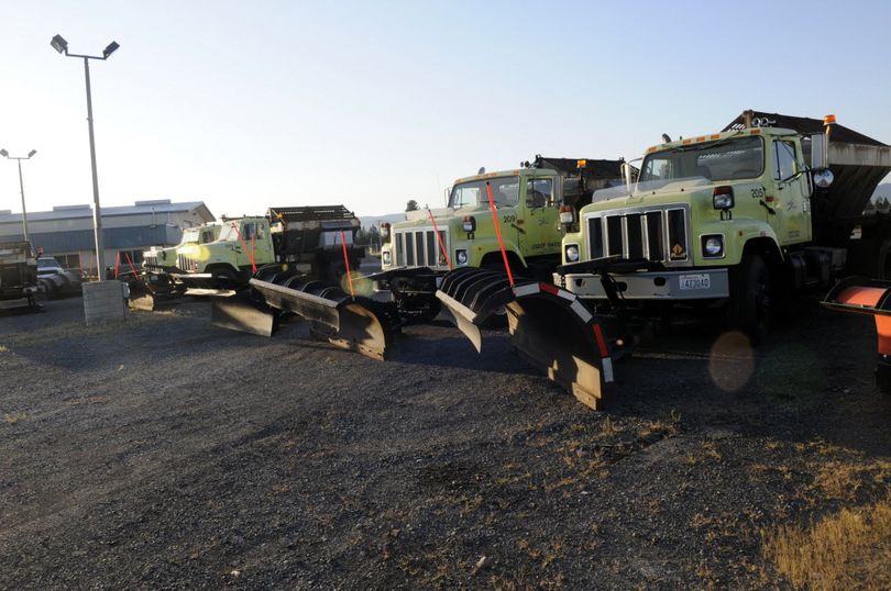 Snowplows are parked waiting for winter at the new City of Spokane Valley public works facility on East Euclid Avenue just west of Flora Road near the Spokane Business and Industrial Park. (J. Bart Rayniak)