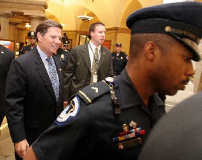 
House Majority Leader Tom Delay of Texas walks to a Republican meeting on Capitol Hill on Wednesday after a Texas grand jury indicted him and two political associates on conspiracy counts in connection with a campaign finance scheme. 
 (Associated Press / The Spokesman-Review)