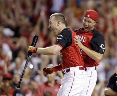 Todd Frazier, left, celebrates after beating Joc Pederson to win the All-Star baseball Home Run Derby in his home ballpark in Cincinnai. (Associated Press)