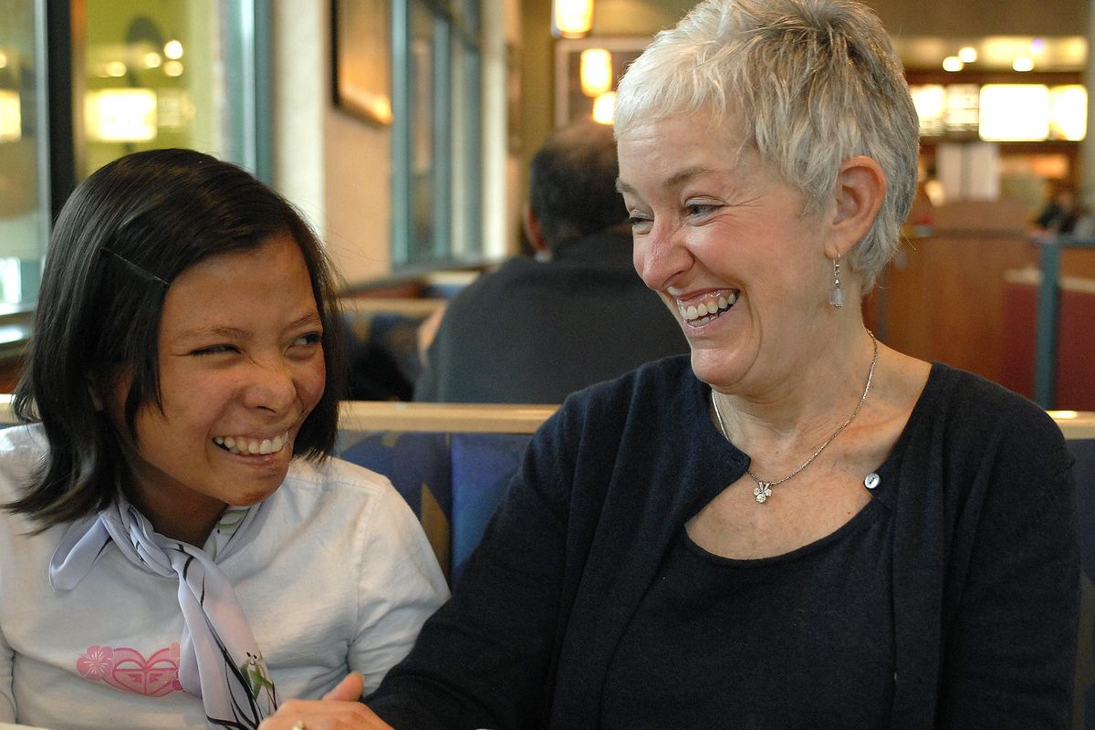 Carolyn Walchak and Dao Nguyen have developed a mother daughter realtionship over the past few months. (Dan Pelle / The Spokesman-Review)