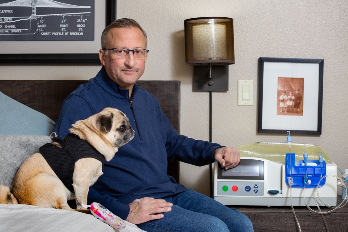 Andrew Storfer uses a peritoneal dialysis machine for eight hours every night at his home in Pullman while he is waiting for a kidney transplant. Storfer will be part of a Northwest Passages panel discussion on Oct. 23 at Gonzaga University. (Geoff Crimmins/For The Spokesman-Review)