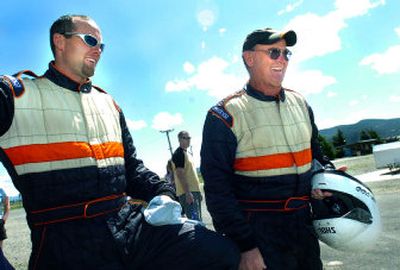 
Todd and Bill Welch, right, give each other a hard time before taking their turn on Stateline Speedway for Father's Day.
 (The Spokesman-Review)