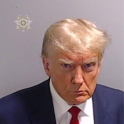 In a handout provided by the Fulton County Sheriff’s Office, former President Donald Trump poses for his booking photo at the Fulton County Jail on Thursday, Aug. 24 in Atlanta Trump was booked on 13 charges related to an alleged plan to overturn the results of the 2020 presidential election in Georgia.  (Tribune News Service)