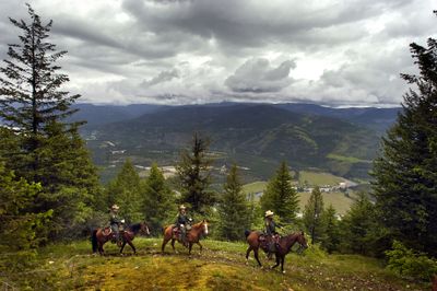 U.S. Border Patrol agents conduct a backcountry horse patrol  near the Canadian border on June 5, 2006.  (File / The Spokesman-Review)