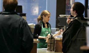 
Barista Salina Nickell prepares a coffee drink for a customer at the Starbucks store on the first floor of the Columbia Center, the tallest building in Seattle, which also has a Starbucks on the 40th floor.
 (Associated Press / The Spokesman-Review)