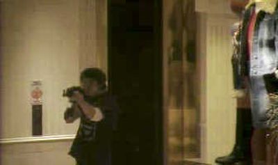 
This image taken from a surveillance camera and released by the Omaha Police Department on Friday shows Robert Hawkins aiming an AK-47 assault rifle in the Von Maur store in the Westroads Mall. Associated Press
 (Associated Press / The Spokesman-Review)