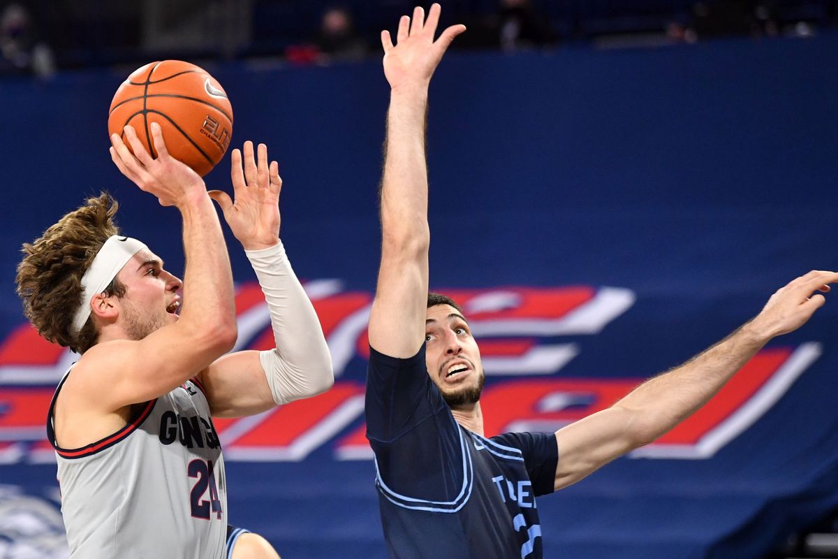 Gonzaga Bulldogs forward Corey Kispert (24) drives the ball to the hoop during the first half of a college basketball game on Saturday, February 20, 2021, at McCarthey Athletic Center in Spokane, Wash. Gonzaga led 51-22 at the half.  (Tyler Tjomsland / The Spokesman-Review)