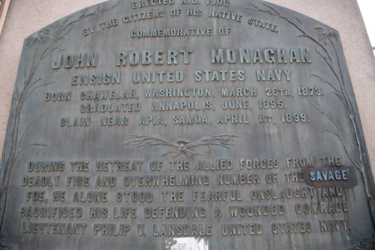 This is the plaque on the back of the statue of John Monaghan at Monroe Street and Riverside Avenue in downtown Spokane.  (Jesse Tinsley/The Spokesman-Review)