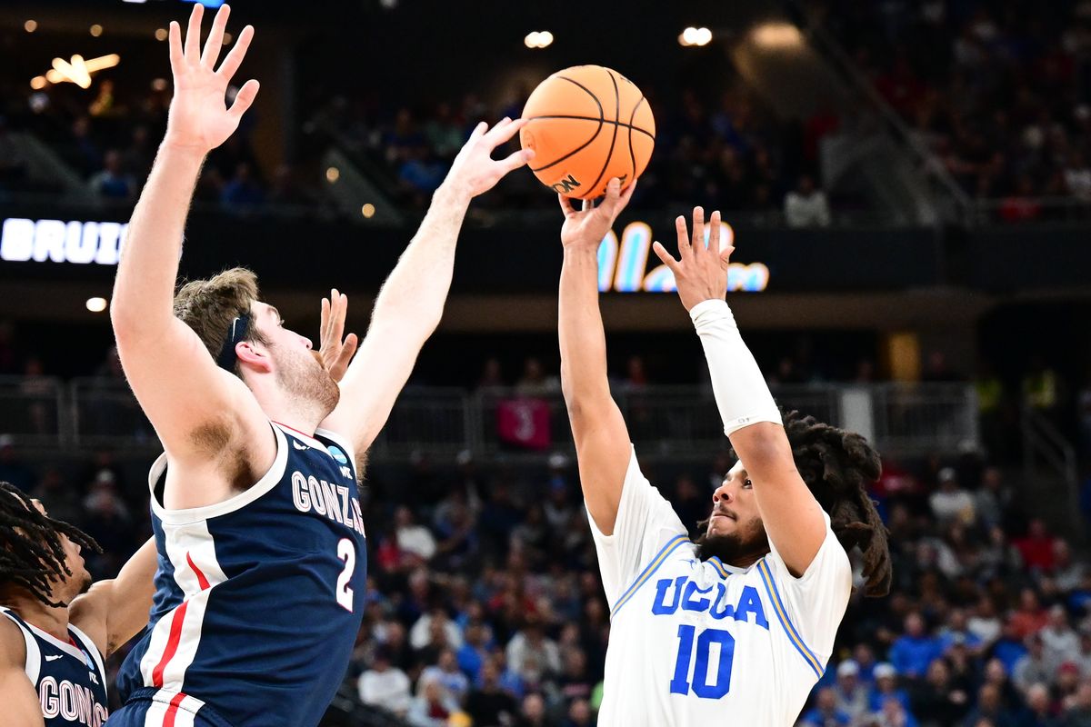 Gonzaga Bulldogs forward Drew Timme (2) tips the shot of UCLA Bruins guard Tyger Campbell (10) during the first half of an NCAA Tournament Sweet Sixteen basketball game on Thursday, March 23, 2023, at T-Mobile Arena in Las Vegas, Nev.  (Tyler Tjomsland/The Spokesman-Review)