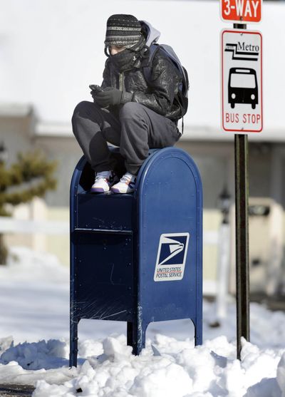 ORG XMIT: PAALL101 Melissa Bentley, 18, of Allentown sits on a mailbox Thursday, Jan. 29, 2009 in Whitehall, Pa. (AP Photo/The Morning Call, Don Fisher) (Don Fisher / The Spokesman-Review)