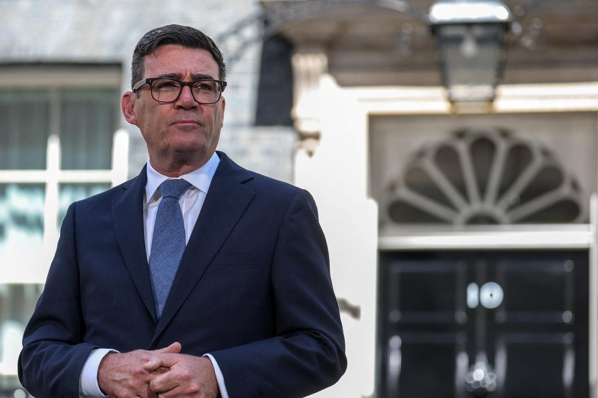 Britain’s newly appointed Prime Minister Andy Burnham looks on as he delivers a speech outside No. 10 Downing Street after taking office Monday in London.  (Reuters)