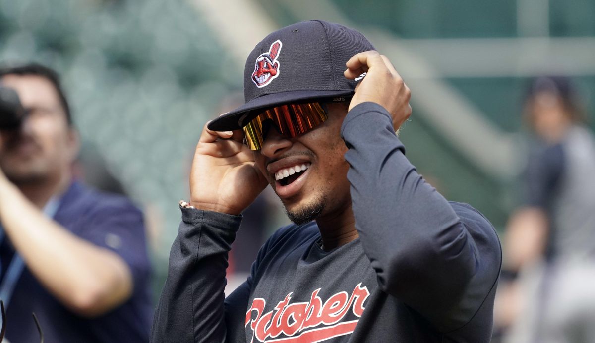 Cleveland Indians shortstop Francisco Lindor puts on his sunglasses before a workout Thursday in Houston. The Indians will play the Houston Astros in Game 1 of the American League Division Series on Friday. (David J. Phillip / AP)