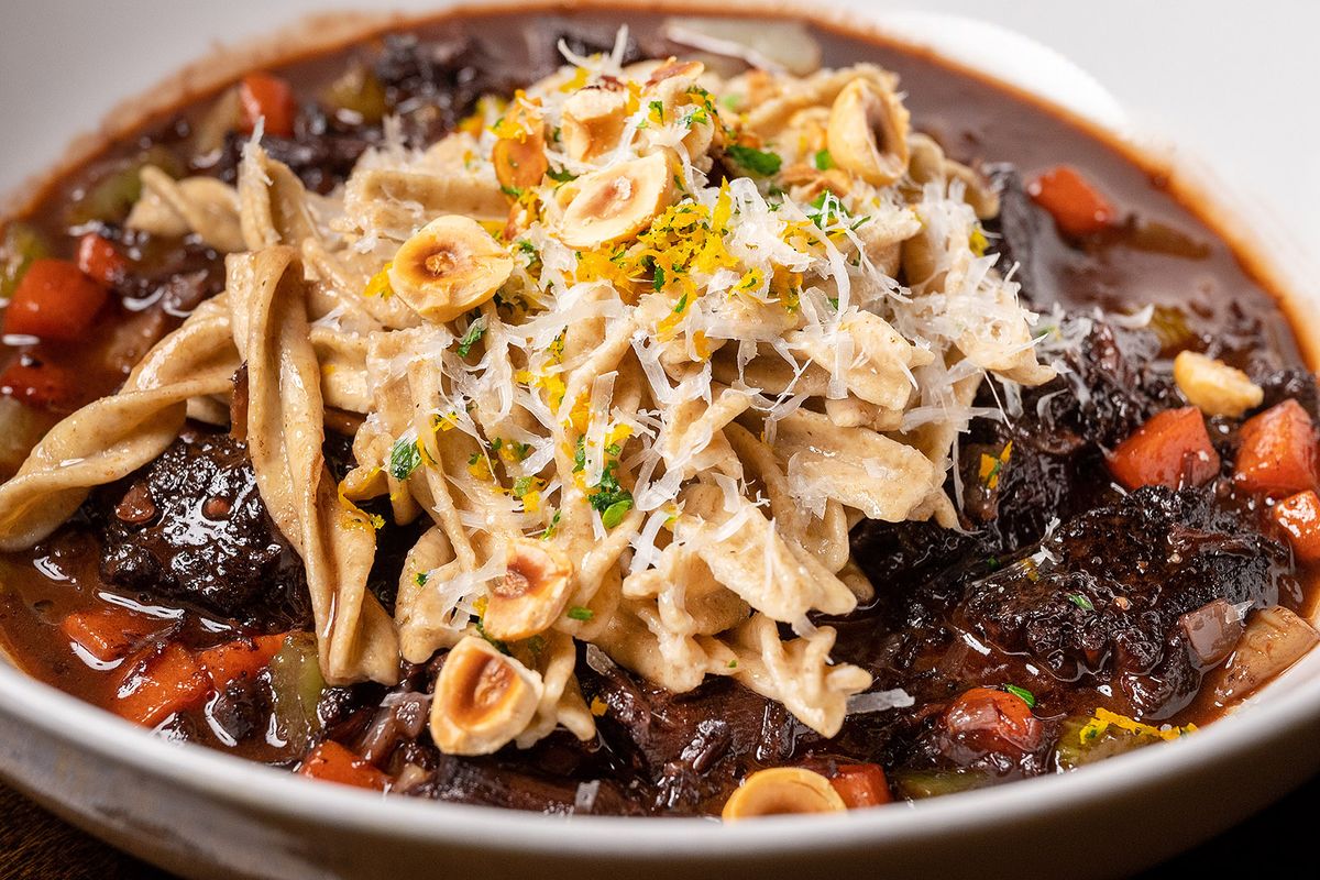 Italia Trattoria’s red wine-braised beef cheeks are served wtih house-made rye fusilli pasta, orange hazelnut gremolata and pecorino cheese.  (Colin Mulvany/The Spokesman-Review)