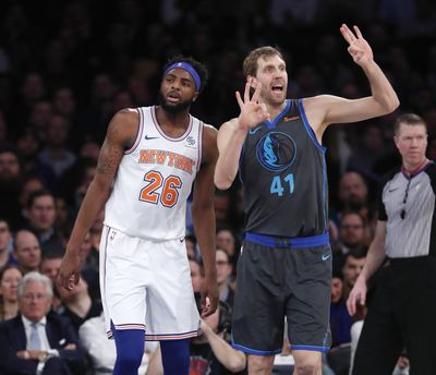 Dallas Mavericks forward Dirk Nowitzki (41) signals to his bench with New York Knicks center Mitchell Robinson (26) awaiting the an official’s call during the first half of an NBA basketball game, Wednesday, Jan. 30, 2019, in New York. (Kathy Willens / Associated Press)