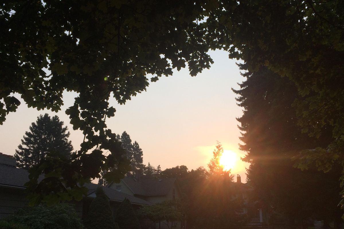 Brown and orange skies prevailed in Spokane early Monday as air quality deteriorated to the ‘unhealthy’ category. (Jonathan Brunt / The Spokesman-Review)