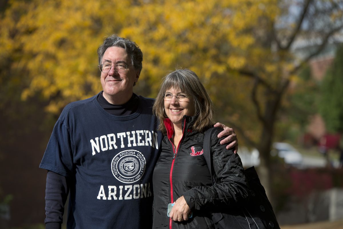Paul Turner poses Friday with Karen Wichman, Eastern Washington University’s director of facilities services, in Cheney. (Dan Pelle)