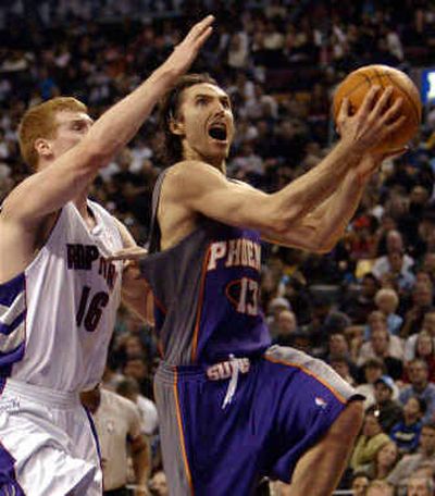 
With guard Steve Nash, right, back in the lineup, the Phoenix Suns have averaged 123 points in their last six games. 
 (Associated Press / The Spokesman-Review)