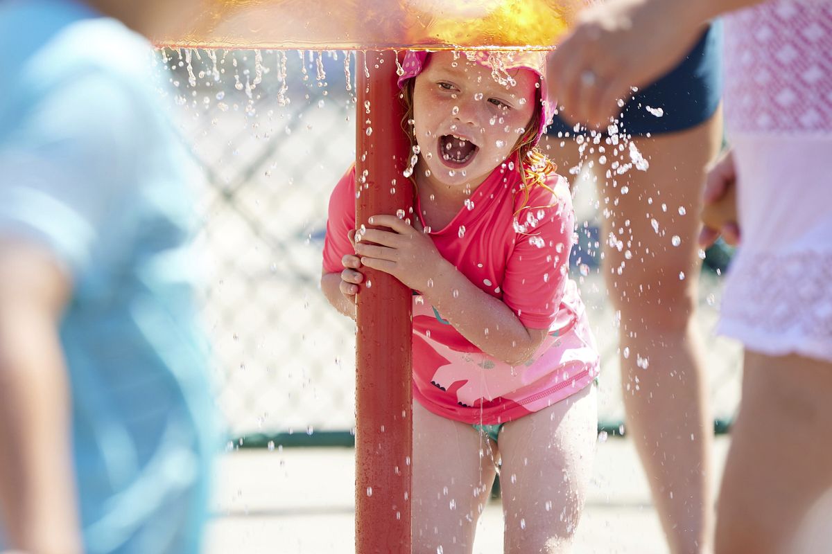 Raegan Sack, 4, cools off at Max Patterson Park during a record setting heat wave in Gladstone, Ore., Sunday, June 27, 2021. Yesterday set a record high for the day with more records expected today.  (Craig Mitchelldyer)