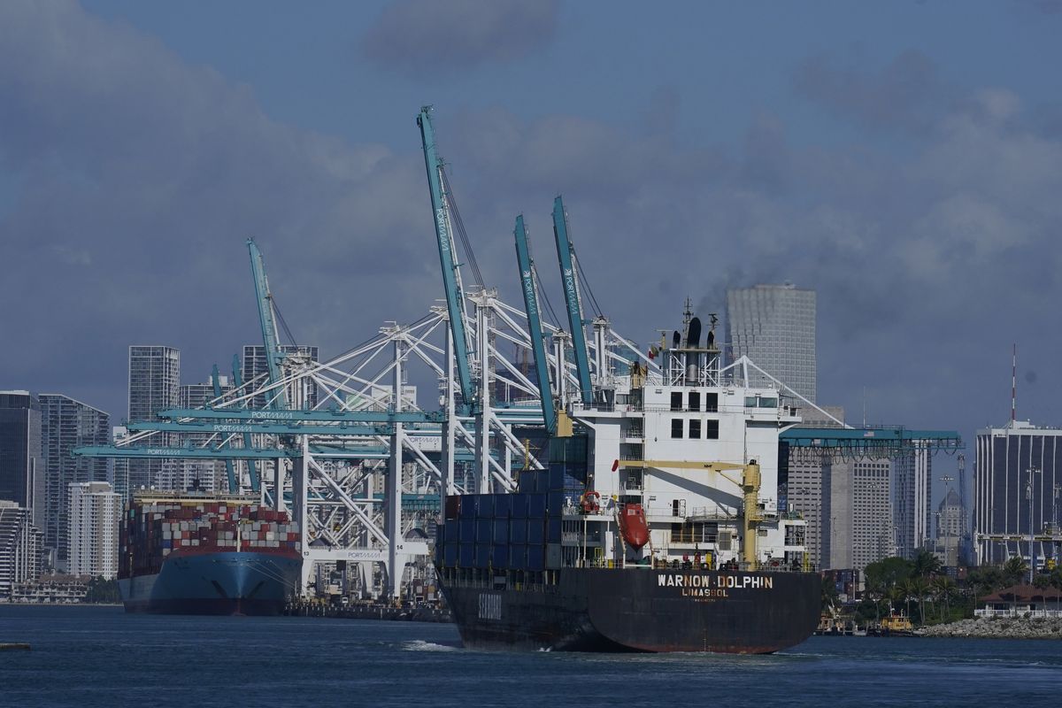 A Warnow-Dolphin container ship enters PortMiami, in Miami Beach, Fla., in April.  (Marta Lavandier)