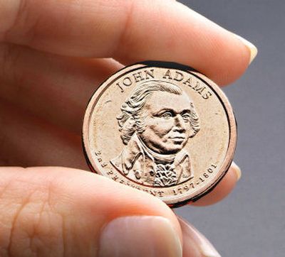 
The  John Adams presidential $1 coin goes into circulation today. 
 (Associated Press / The Spokesman-Review)