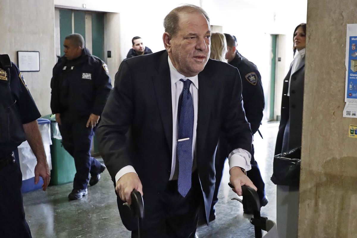 FILE — In this Feb. 21, 2020 file photo, Harvey Weinstein arrives at a Manhattan court as jury deliberations continue in his rape trial, in New York. More than a year after Weinstein