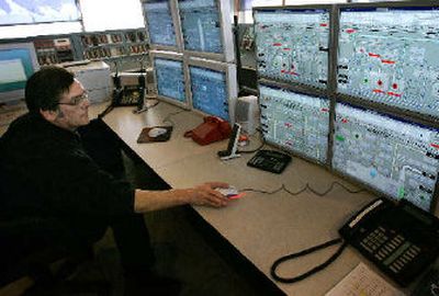 
Control room operator Joe Grenda monitors the system at the Distrigas liquid natural gas plant in Everett, Mass.
 (Associated Press / The Spokesman-Review)