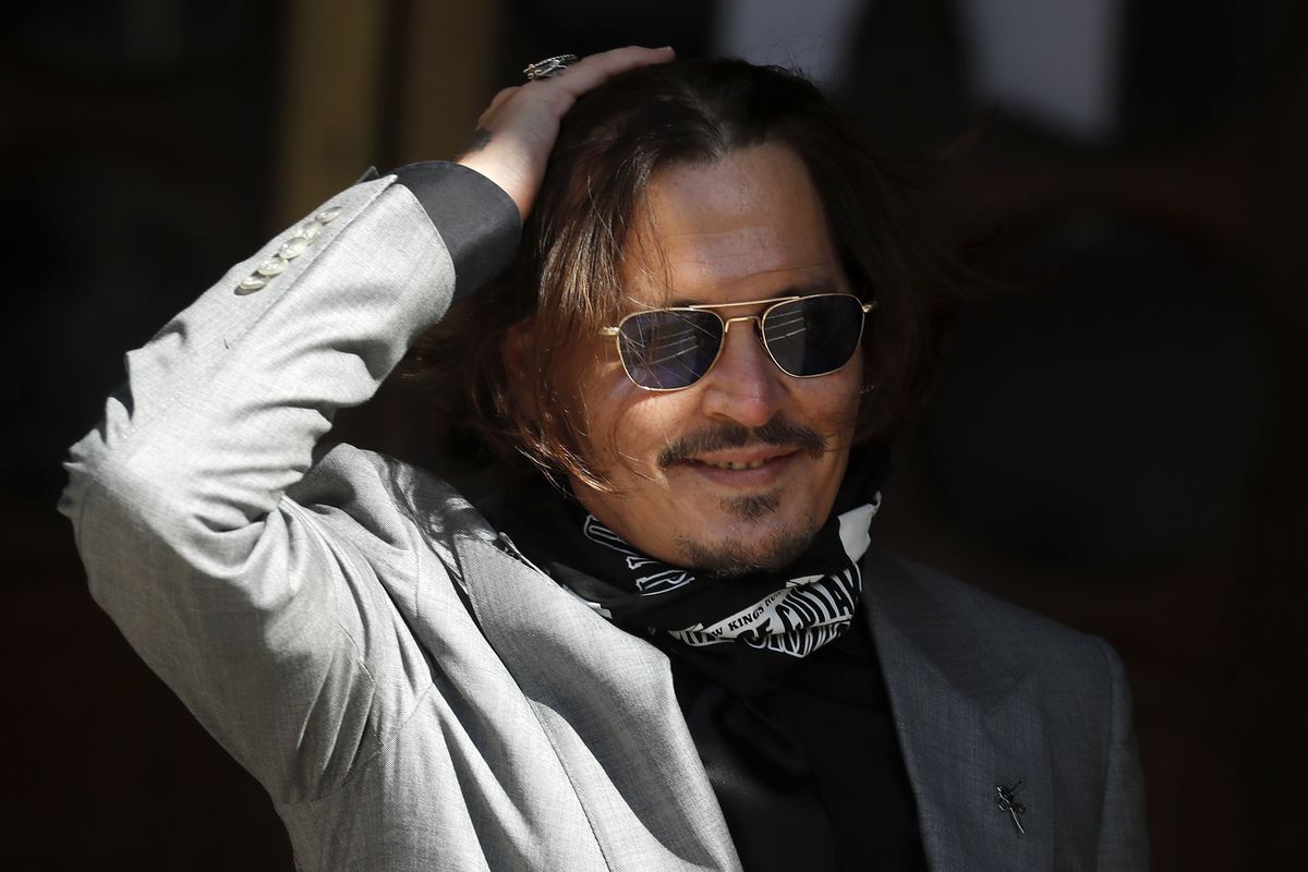 FILE - In this file photo dated Tuesday, July 28, 2020, US Actor Johnny Depp arrives at the High Court in London during his case against News Group Newspapers over a story published about his former wife Amber Heard, which branded him a 
