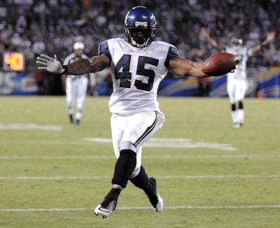 Seahawks running back Thomas Clayton celebrates his go-ahead touchdown late in the fourth quarter. (Associated Press)