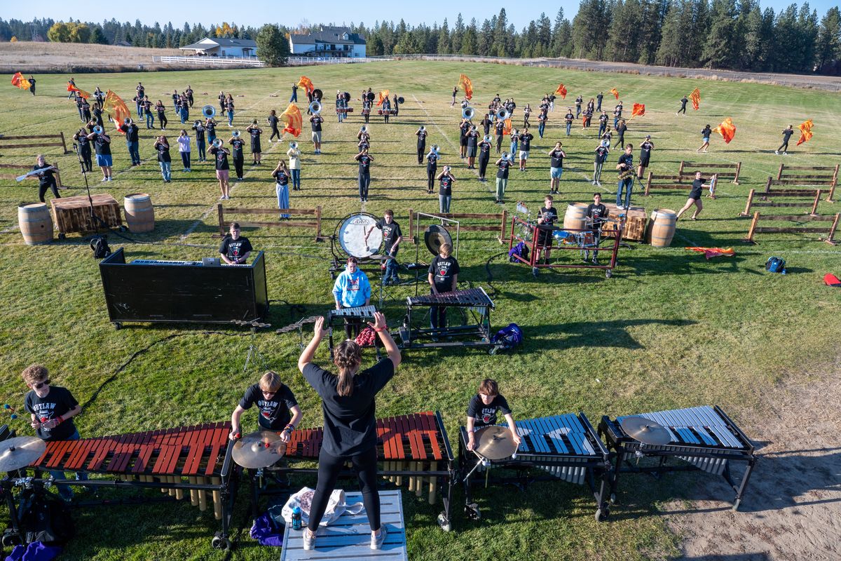 The Mt. Spokane High School band practices behind the school, Tuesday, Oct. 20, 2021. After missing last fall, local high school marching bands are back and entertaining crowds at football games.  (COLIN MULVANY/THE SPOKESMAN-REVI)