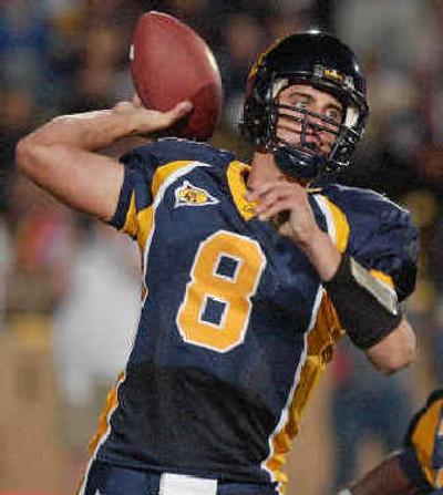 
Golden Bears quarterback Aaron Rodgers, left, has averaged an impressive three completions for every four pass attempts this season, while QB Andrew Walter has tossed 21 touchdown passes in the Sun Devils' go-for-broke offense. 
 (Associated Press / The Spokesman-Review)