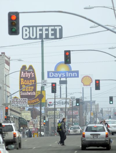 The buffet sign on Third Avenue in Spokane is one of the tallest around.  (Jesse Tinsley / The Spokesman-Review)