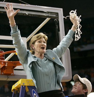 In this April 8, 2008, file photo, Tennessee coach Pat Summitt holds up the net as her son, Tyler, looks on after Tennessee beat Stanford 64-48 to win its eighth national women's basketball championship, at the NCAA women's basketball tournament Final Four in Tampa, Fla. (Gerry Broome / AP)