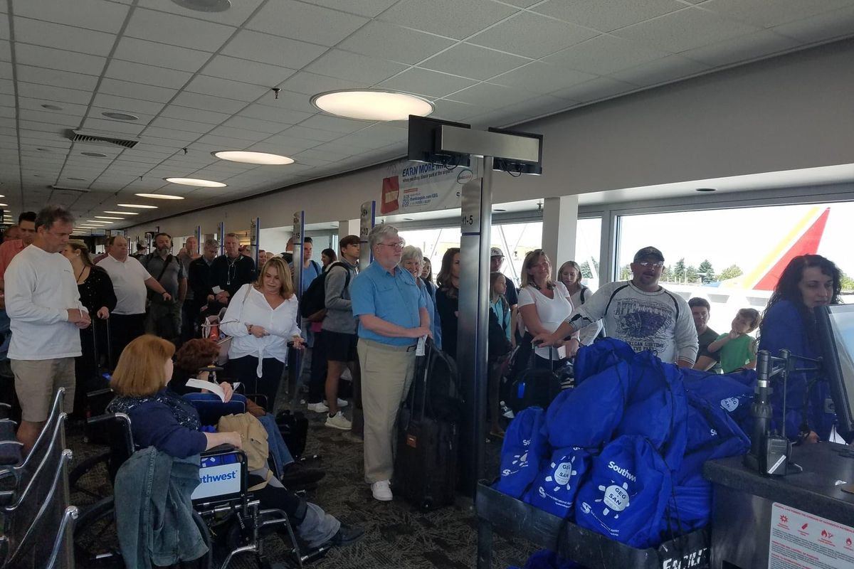 Passengers for Southwest Airline’s new direct flight from Spokane to San Diego line up at the Spokane International Airport in the boarding area Sunday, June 9, 2019. (Rebecca White / The Spokesman-Review)