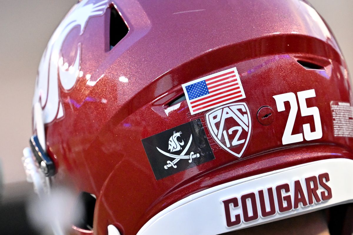 Washington State helmets sported a pirate flag decal in honor of former coach Mike Leach for Saturday’s game against Texas Tech at Gesa Field in Pullman.  (Tyler Tjomsland/The Spokesman-Review)