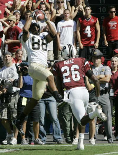 
Vanderbilt's George Smith catches a first-half touchdown pass as South Carolina's Brandon Isaac looks on. Associated Press
 (Associated Press / The Spokesman-Review)