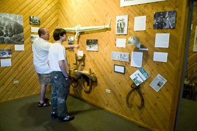 Rick Justus and Daylon Orr, 13, check out the new “Observing North Idaho’s Forest Dynamics” exhibit at the North Idaho Museum  recently. (Colin Mulvany / The Spokesman-Review)