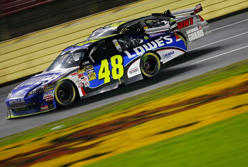 Jimmie Johnson held off Jeff Gordon to win the NASCAR Banking 500 only from Bank of America at Lowe's Motor Speedway, his second straight victory. (Photo Credit: Geoff Burke/Getty Images for NASCAR) (Geoff Burke / The Spokesman-Review)