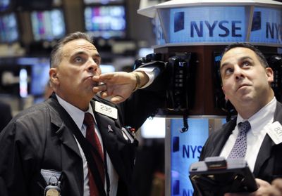 Traders work on the floor of the New York Stock Exchange on Thursday. Stocks have plunged to levels not seen in five years.  (Associated Press / The Spokesman-Review)